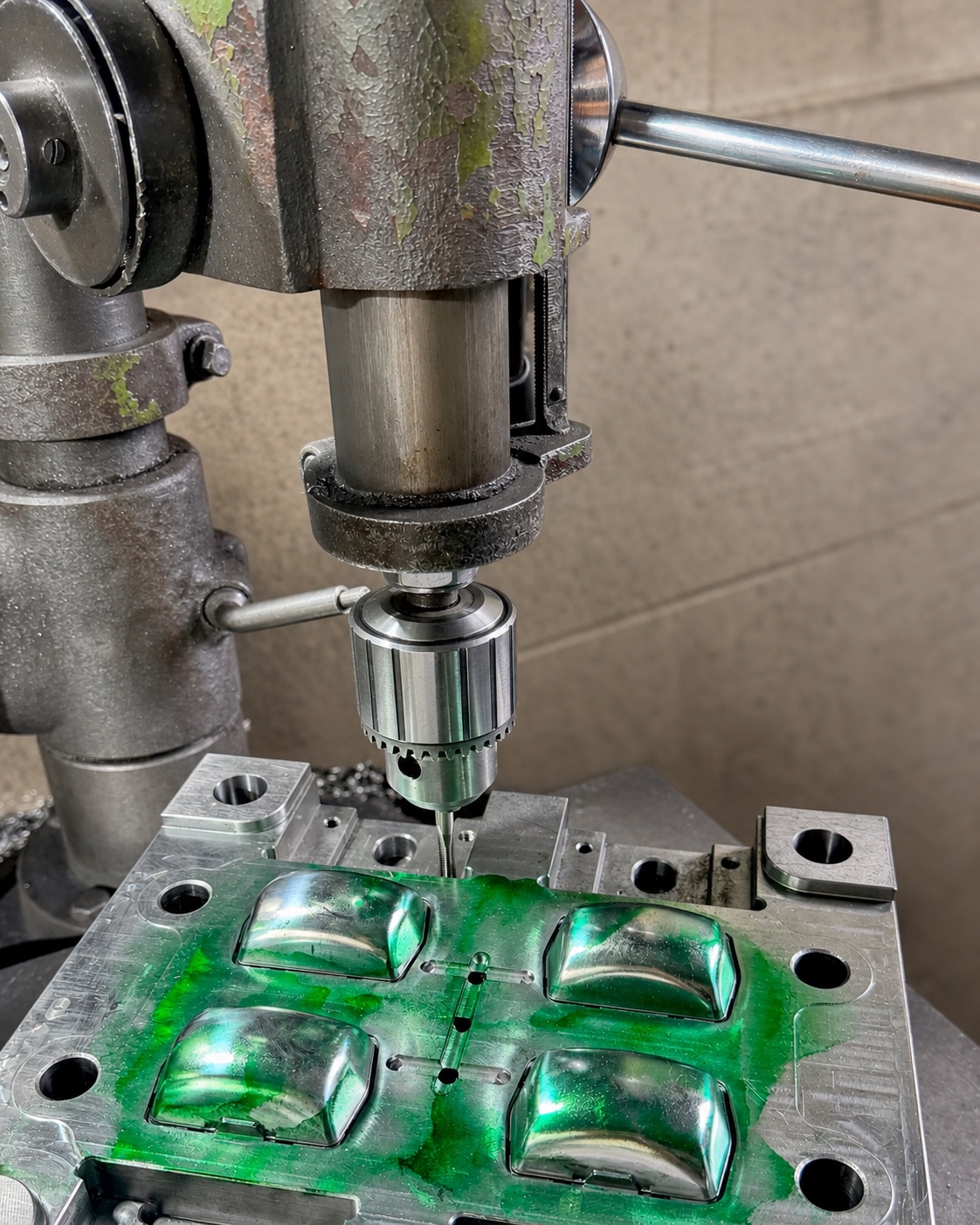 Drilling operation on a metal mold during tooling preparation